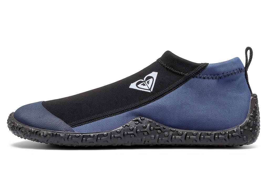 Roxy Women's Water Shoes ERJWW03006 being rinsed on a beach after a surf session